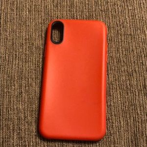 Red and black IPhone X phone case